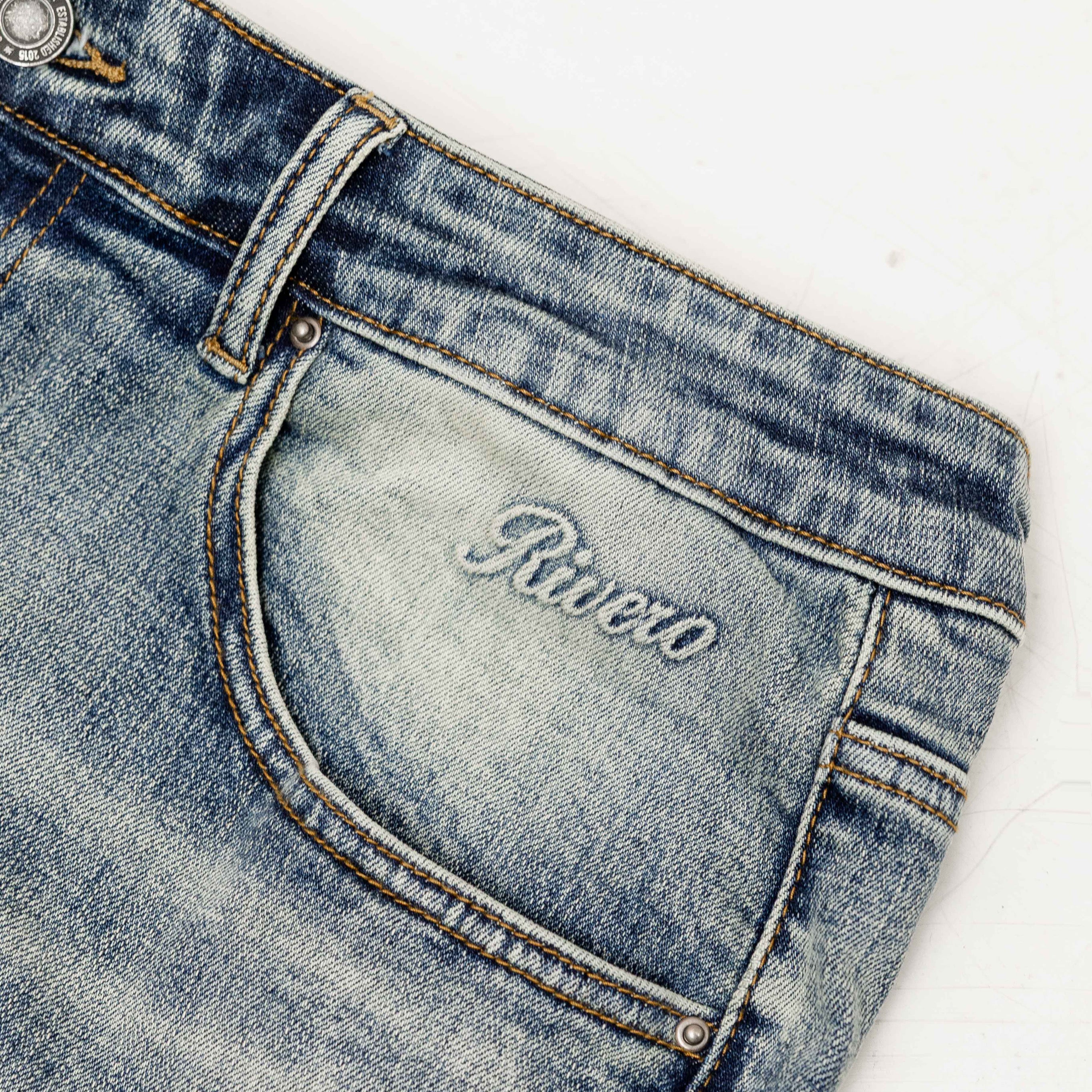 RELAXED FADED FOLD DENIM JEANS