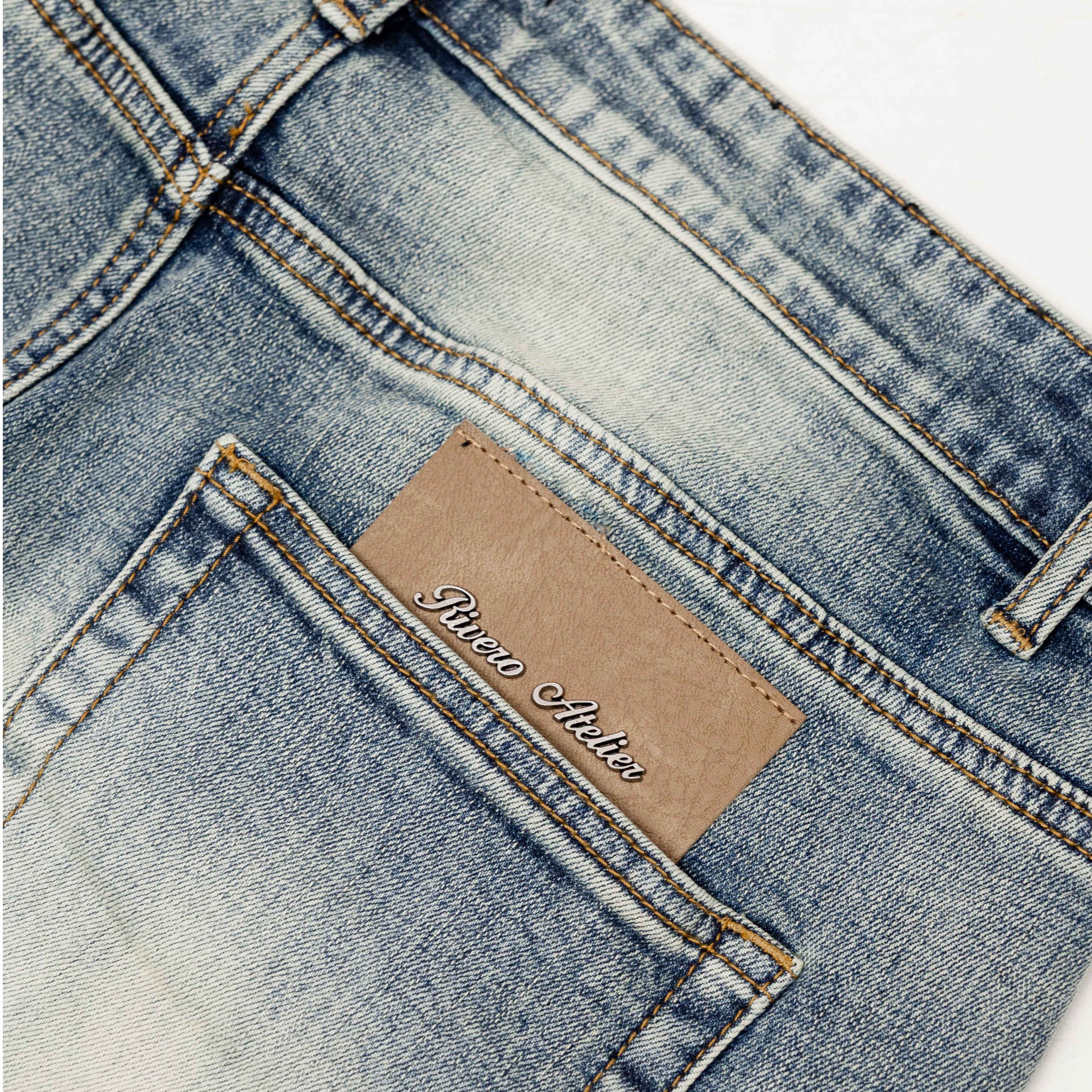RELAXED FADED FOLD DENIM JEANS