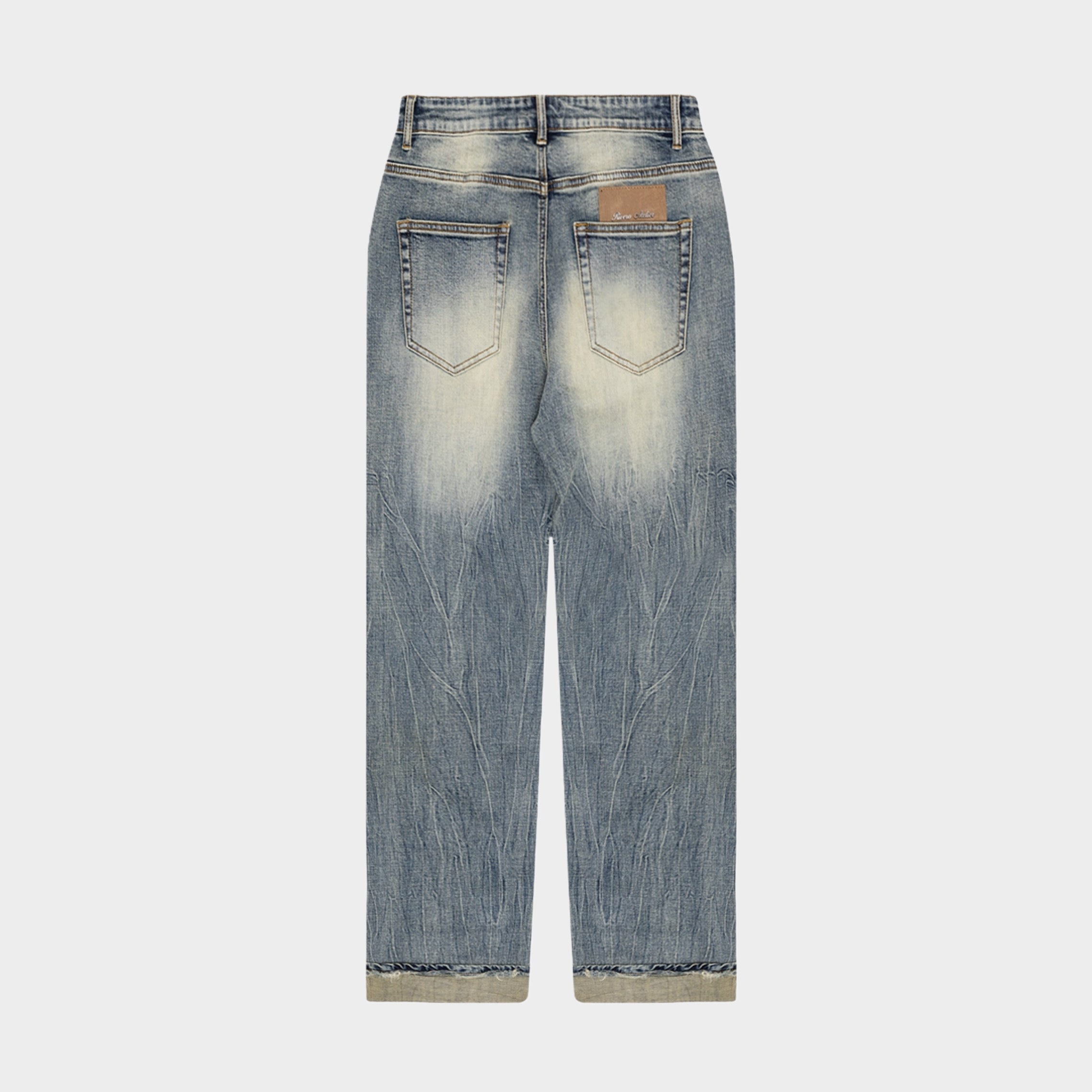RELAXED FADED FOLD DENIM JEANS