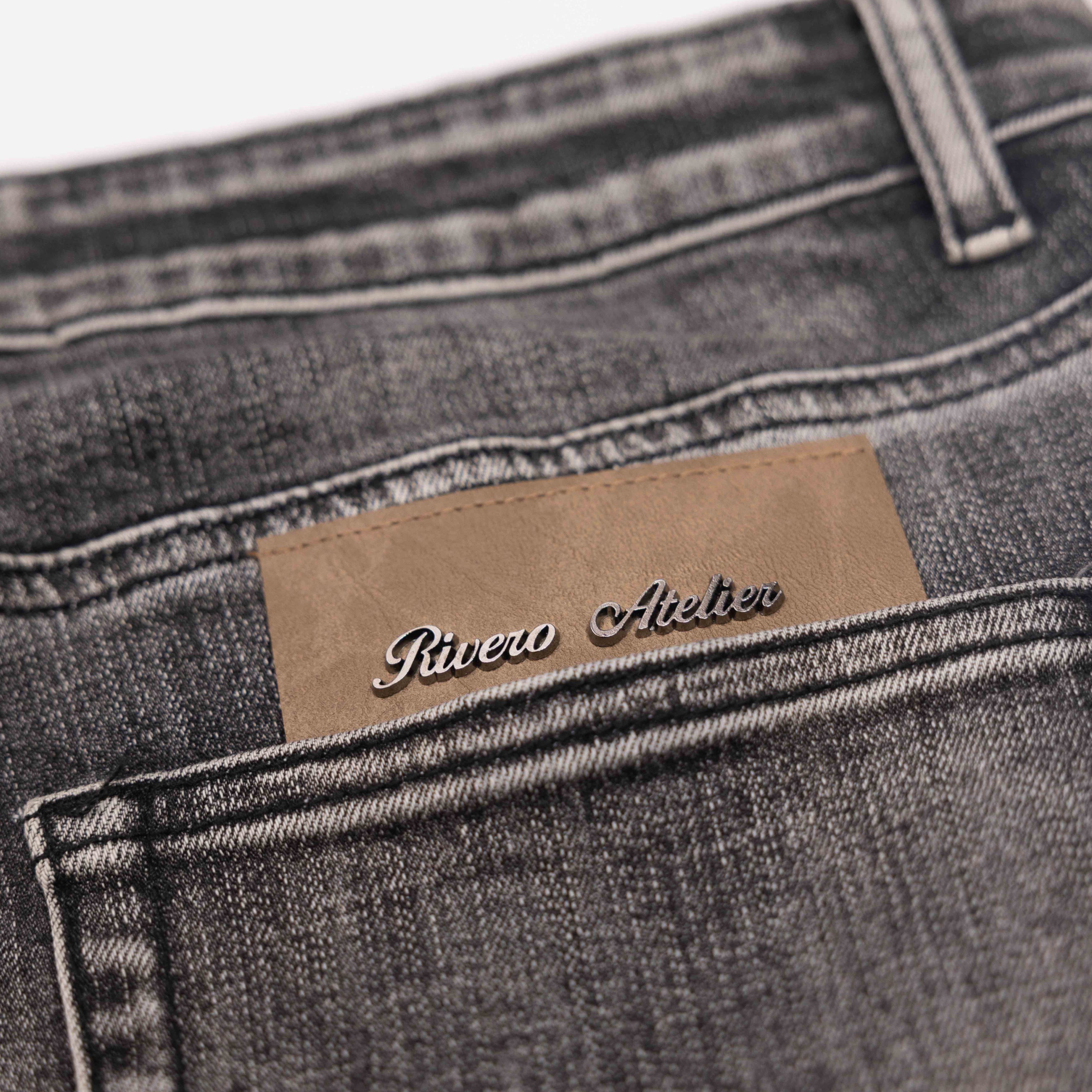 RELAXED FADED FOLD DENIM JEANS