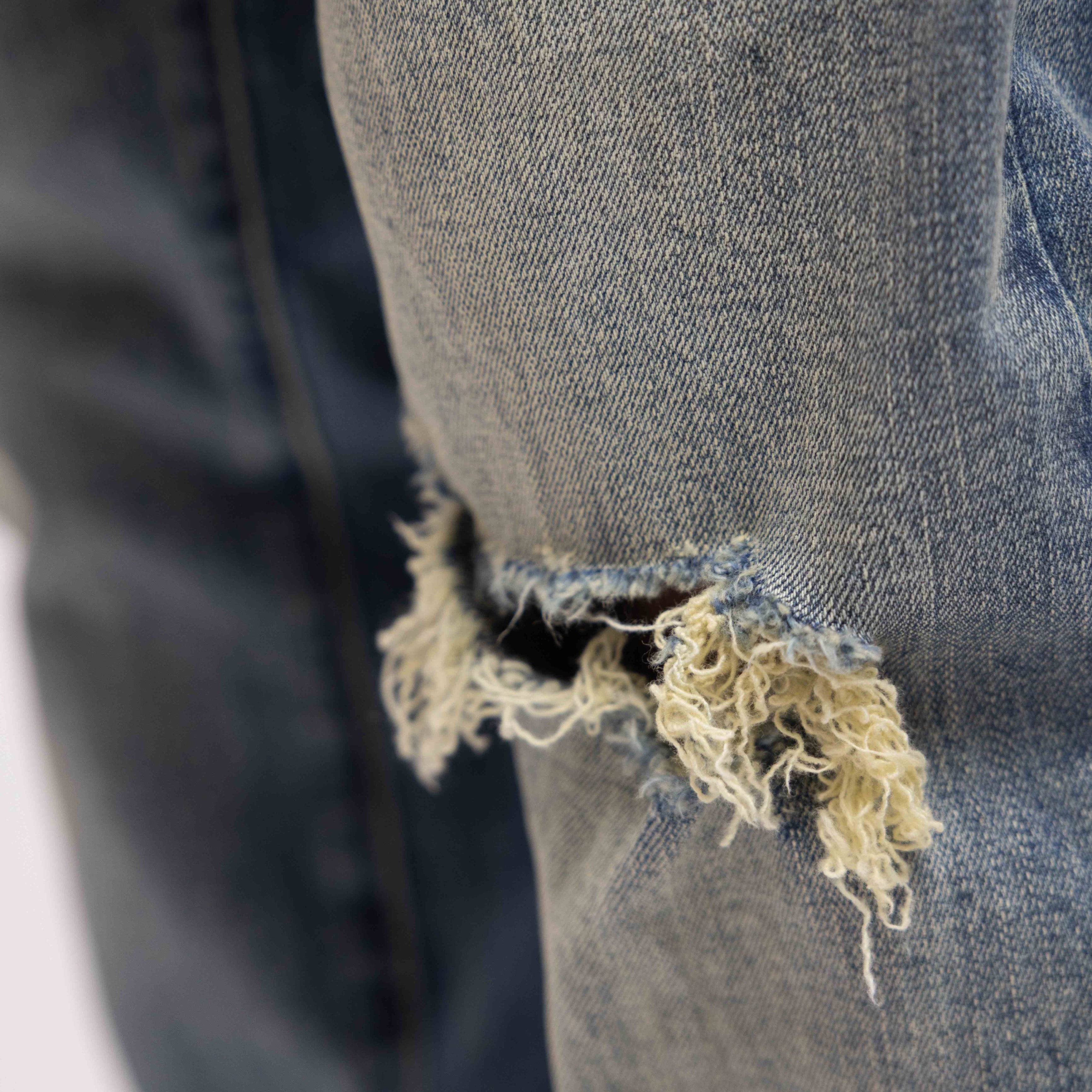 DESTROYER BUTTONED DENIM JEANS