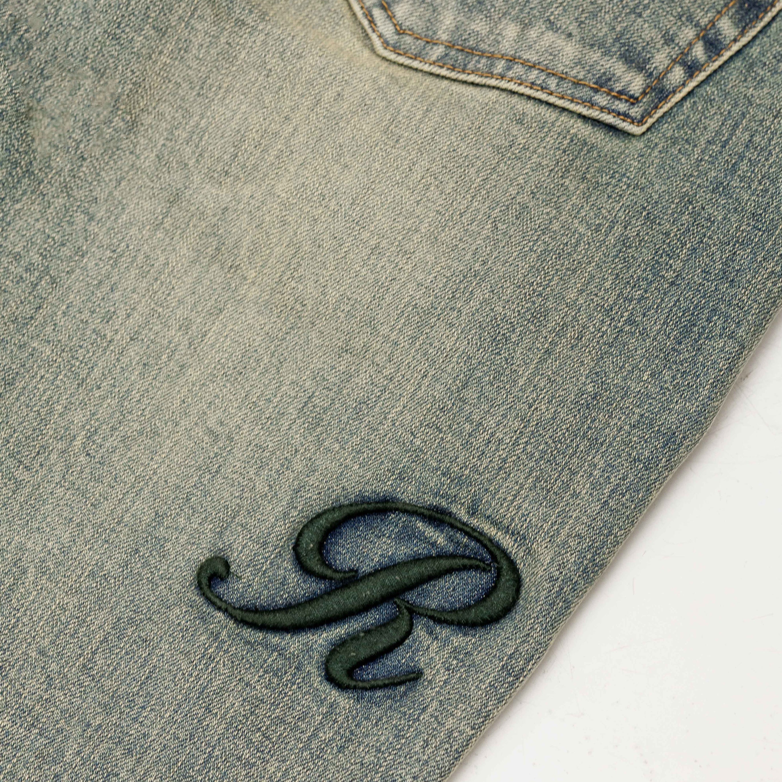 RAISED MONOGRAM BUTTONED DENIM JEANS PRE-ORDER