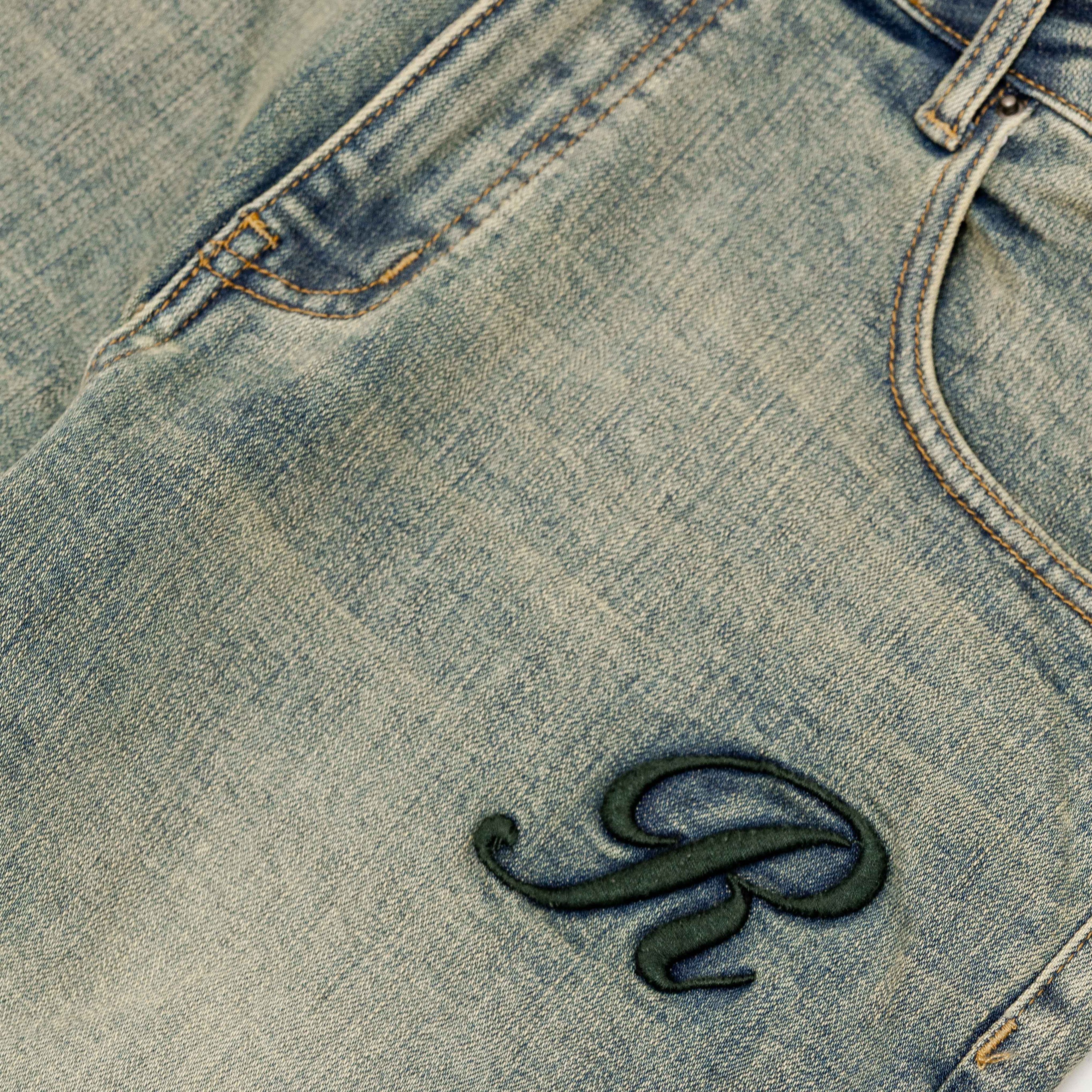 RAISED MONOGRAM BUTTONED DENIM JEANS PRE-ORDER