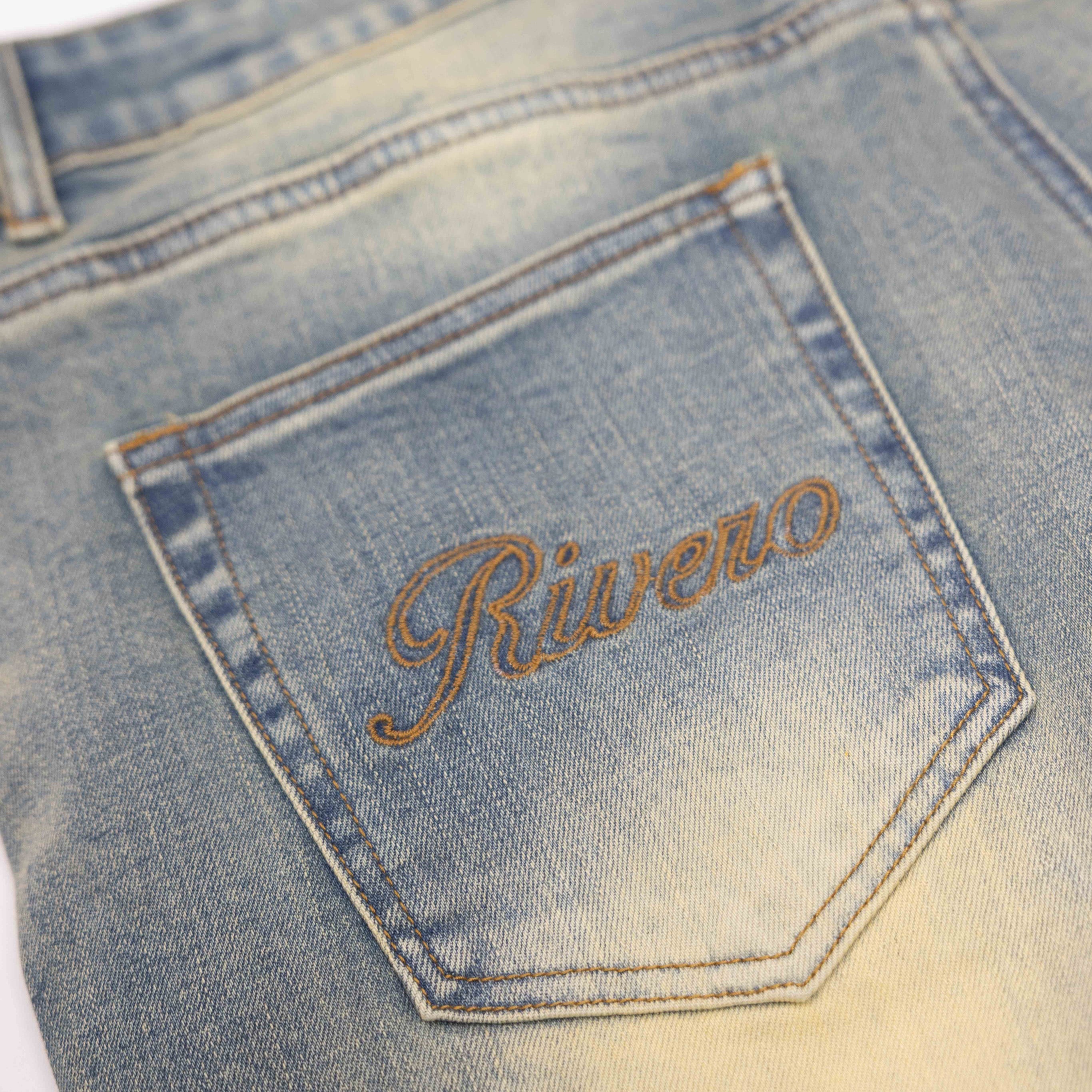 SEGMENTED WASHED DENIM JEANS