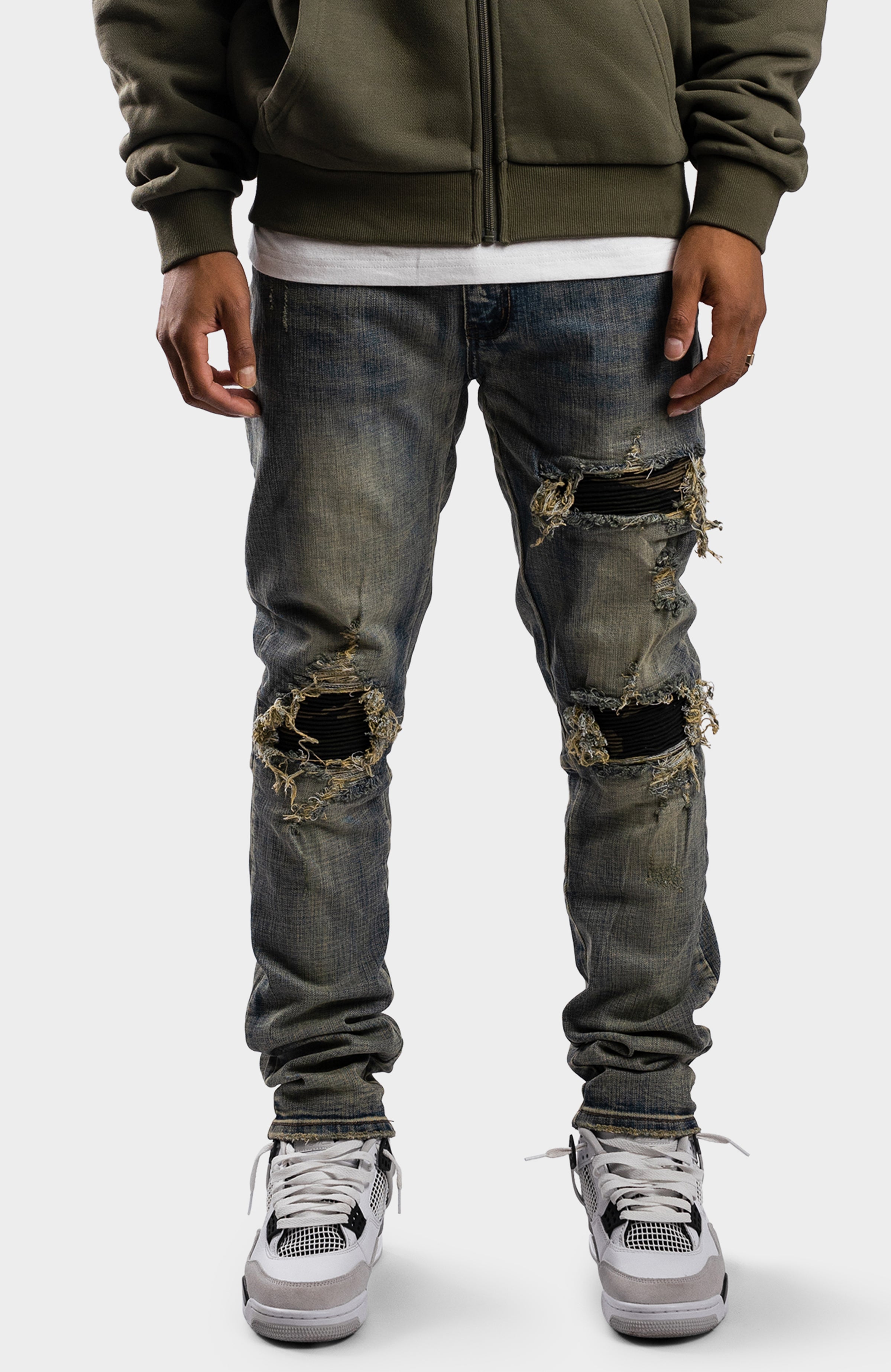 DISTRESSED DENIM JEANS