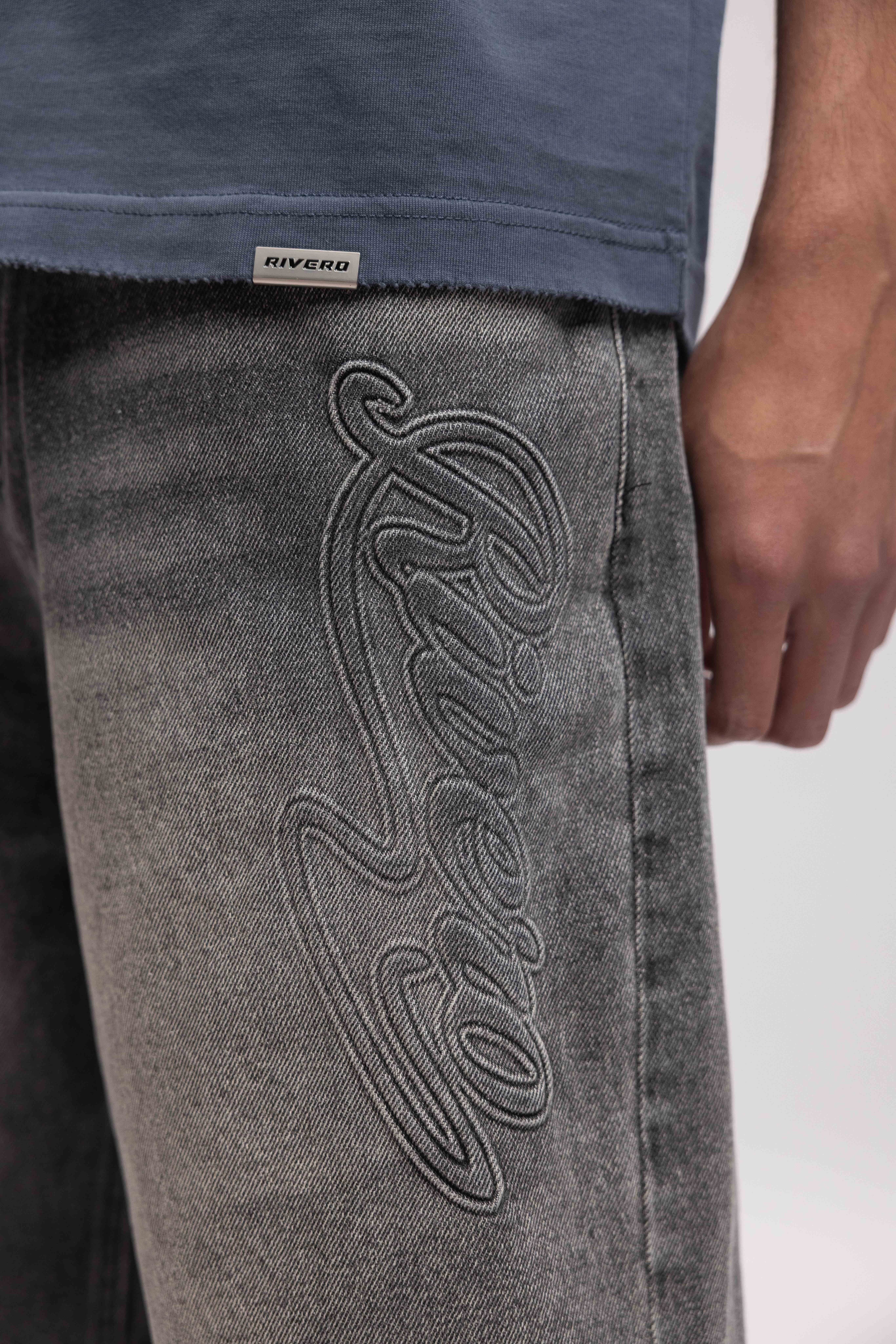 SCRIPT EMBOSSED DENIM SHORTS BLACK
