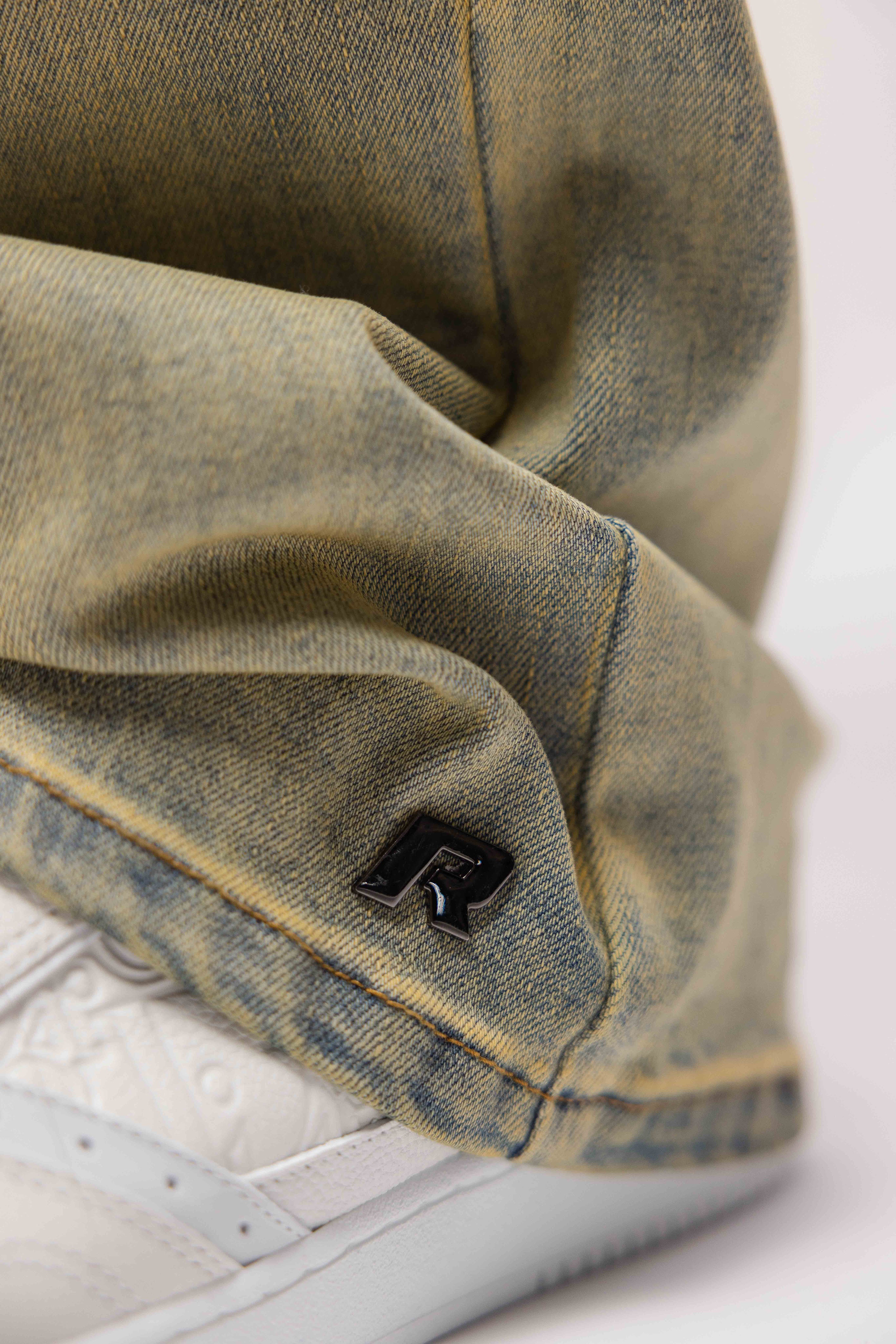 SCRIPT WASHED DENIM JEANS