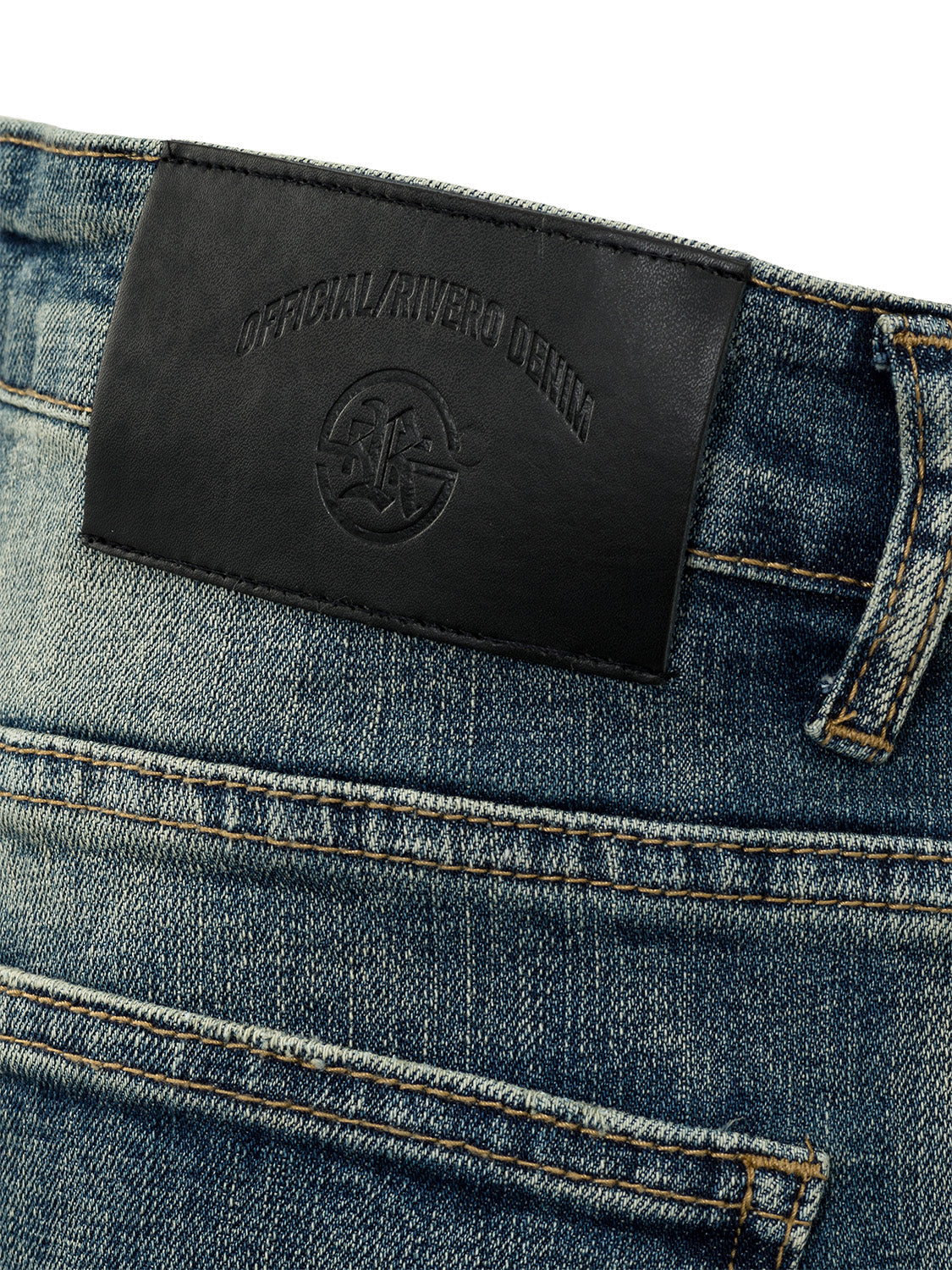 DISTRESSED DENIM JEANS